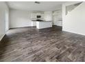 Open concept kitchen with white cabinets and a large island at 410 Cedarview Rd, Summerville, SC 29486