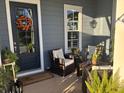 Relaxing front porch with seating and plants, perfect for enjoying the outdoors at 3105 Sturbridge Rd, Mount Pleasant, SC 29466