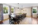 Large dining room with a long table and plenty of seating at 109 Beacon Ave, Moncks Corner, SC 29461