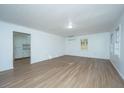 Bright living room with light wood laminate flooring and an open concept at 110 Edgebrook Dr # 28, Summerville, SC 29486