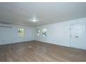 Spacious living area featuring light wood laminate floors and an open floor plan at 110 Edgebrook Dr # 28, Summerville, SC 29486