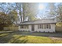 Charming ranch home features a newly renovated exterior, freshly painted brick, and a fenced yard at 114 Stephanie Cir, Summerville, SC 29483