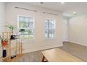 Living room with wood-look floors and neutral walls at 113 Corvus St, Summerville, SC 29483