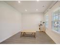 Spacious office with wood-look floors and large windows at 113 Corvus St, Summerville, SC 29483