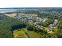 Aerial view of Liberty Hill Farm community, showcasing homes and waterways at 1695 Cultivation Lane St # 463, Mount Pleasant, SC 29466