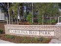 Carolina Bay Park entrance, brick signage, landscaping, welcoming atmosphere at 4135 Collins Dr, Charleston, SC 29414