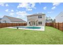Large backyard with a private inground pool at 104 Belgian Ct, Summerville, SC 29486