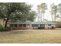 Brick ranch home with large yard and mature trees at 106 Reardon Ave, Walterboro, SC 29488