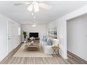 Bright living room with hardwood floors and modern furniture at 211 Water Wheel Rd, Ridgeville, SC 29472