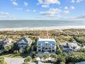 Luxury coastal home with ocean views and a boardwalk nearby at 8 54Th Ave, Isle of Palms, SC 29451