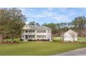 Two story house with detached garage and large lot at 1129 Plantation Overlook Dr, Moncks Corner, SC 29461