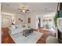 Spacious living room with hardwood floors, a fireplace, and neutral decor at 116 Hearthstone Cir, Goose Creek, SC 29445