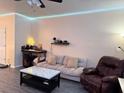 Living room with light grey couch, recliner, and marble-top coffee table at 148 Pine Shadow Dr, Goose Creek, SC 29445