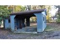 Detached garage with corrugated metal siding at 412 Live Oak St, Walterboro, SC 29488