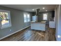 Renovated kitchen featuring an island and modern appliances at 412 Live Oak St, Walterboro, SC 29488