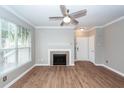 Living room featuring hardwood floors and a fireplace at 45 Sycamore Ave # 1323, Charleston, SC 29407