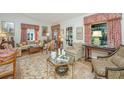 Spacious living room featuring hardwood floors, comfy seating, and large windows at 46 Chadwick Dr, Charleston, SC 29407