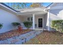 Inviting front yard with a charming walkway leading to a cozy entrance at 101 Mary St, Summerville, SC 29483