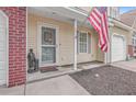 Inviting front door entrance with American flag and landscaping at 271 Kelsey Blvd, Charleston, SC 29492