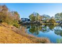 House with a pond view in a wooded neighborhood at 7011 Windmill Creek Rd, Charleston, SC 29414