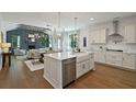 Open concept kitchen with island and stainless steel appliances at 768 Maynard Ln, Summerville, SC 29486