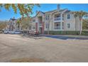 View of apartment building exterior with parking and landscaping at 1600 Long Grove Dr # 914, Mount Pleasant, SC 29466