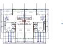 First floor plan of duplex with garages, kitchens, Gathering rooms, and laundry rooms at 9 Wilderness Trl # A, North Charleston, SC 29418