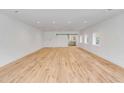 Spacious interior with light oak hardwood floors and white walls at 278 Meeting St, Charleston, SC 29401