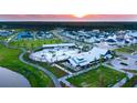 An aerial view of the community including pool and surrounding homes at 517 Rustling Tree Ct, Summerville, SC 29486