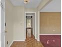 Entryway with parquet flooring and view into adjacent room at 223 Pointer Dr, Summerville, SC 29485