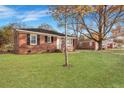 Brick home with large front yard and mature trees at 442 Annette Dr, Goose Creek, SC 29445