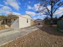 Side view of house with attached garage at 7024 E Constellation Dr, North Charleston, SC 29418