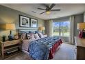 Spacious main bedroom with large window, plush bedding, and ample natural light at 762 Meadowbrook Ln, Summerville, SC 29486