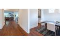 Bright dining room with hardwood floors, and view into the living room at 763 Maynard Ln, Summerville, SC 29486
