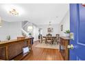 Bright dining area with hardwood floors and a charming wooden table at 527 Tayrn Dr, Wando, SC 29492