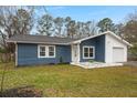 Ranch style home with new siding and landscaping at 607 Mountain Pine Road, Moncks Corner, SC 29461