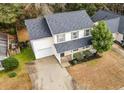 Two-story house with attached garage and driveway, aerial view at 238 Trickle Dr, Summerville, SC 29483