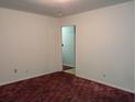 Simple bedroom with carpet and neutral walls at 7660 Crossgate Blvd, North Charleston, SC 29420