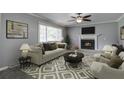 Living room with fireplace and comfy furniture at 114 Farrell St, Moncks Corner, SC 29461