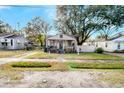 One-story house on a residential street with a yard at 2735 Constitution Ave, North Charleston, SC 29405