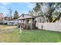Charming one-story house with a porch and fenced yard at 2735 Constitution Ave, North Charleston, SC 29405