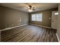 Bright living room with hardwood floors and window at 144 Butterfly Ln, Moncks Corner, SC 29461