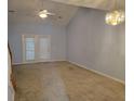 Bright living room featuring vaulted ceilings and carpet at 4743 Skillmaster Ct, North Charleston, SC 29418