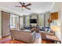 Spacious living room with hardwood floors, a large TV, and comfortable seating at 132 Spring St, Charleston, SC 29403