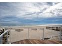 Deck overlooking the beach with ocean view at 1579 E Ashley Ave, Folly Beach, SC 29439