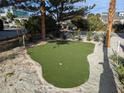 Artificial putting green in a beachfront yard at 1579 E Ashley Ave, Folly Beach, SC 29439