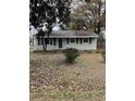 House exterior with green shutters and a yard at 206 Palmetto St, Moncks Corner, SC 29461
