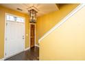 Bright entryway with dark hardwood floors and chandelier at 225 Pimpernel St, Summerville, SC 29483