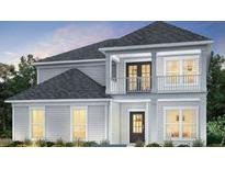 Two story house with balcony and grey siding at 1985 Parish House Cir, Johns Island, SC 29455