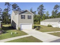 Detached garage with additional storage space at 466 Cedarview Rd, Summerville, SC 29486